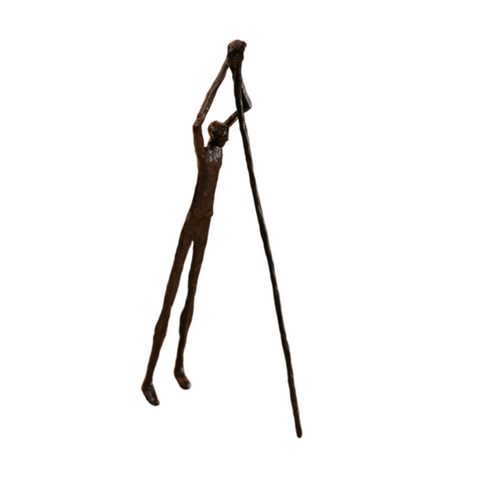 Man With Pole Sculpture